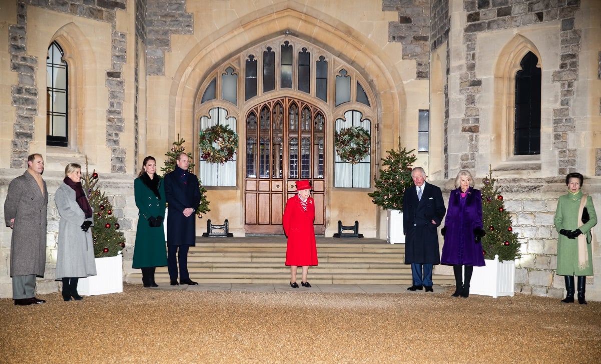 (L to R) Prince Edward, Sophie, Kate Middleton, Prince William, Queen Elizabeth II, Prince Charles, Camilla, and Princess Anne standing outside Windsor Castle