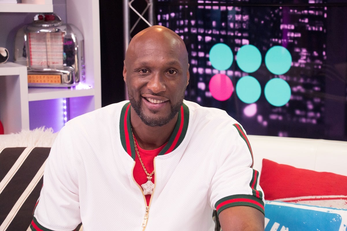 Lamar Odom smiles for a photo during a visit to the Young Hollywood Studio