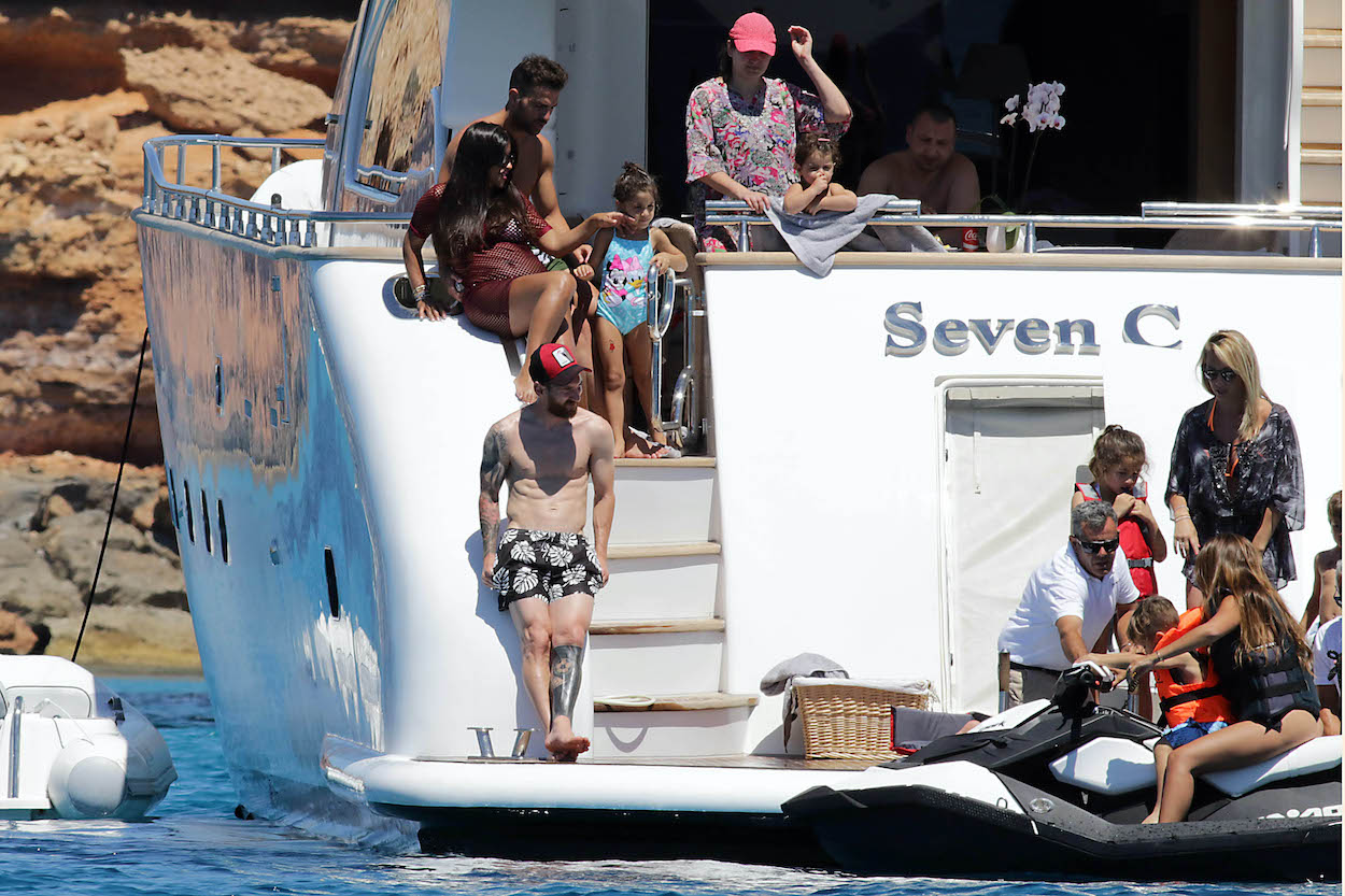 Lionel Messi, Cesc Fabregas and their families are seen in Ibiza