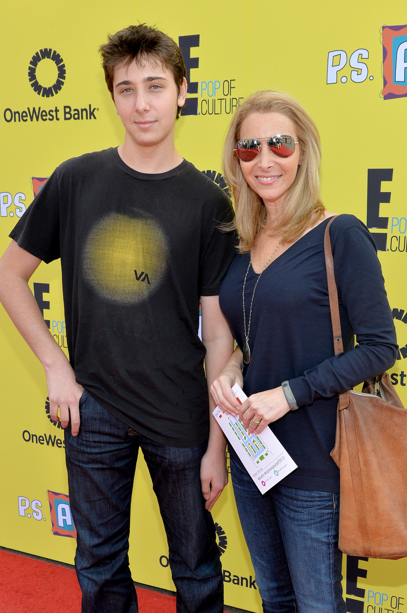 Lisa Kudrow standing with son Julian