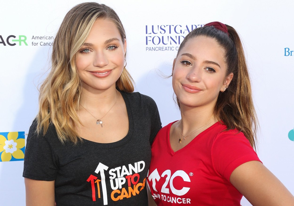 Dance Moms alums Maddie Ziegler and Mackenzie Ziegler pose for the red carpet