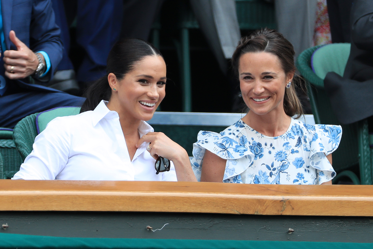 Meghan Markle talking to Pippa Middleton