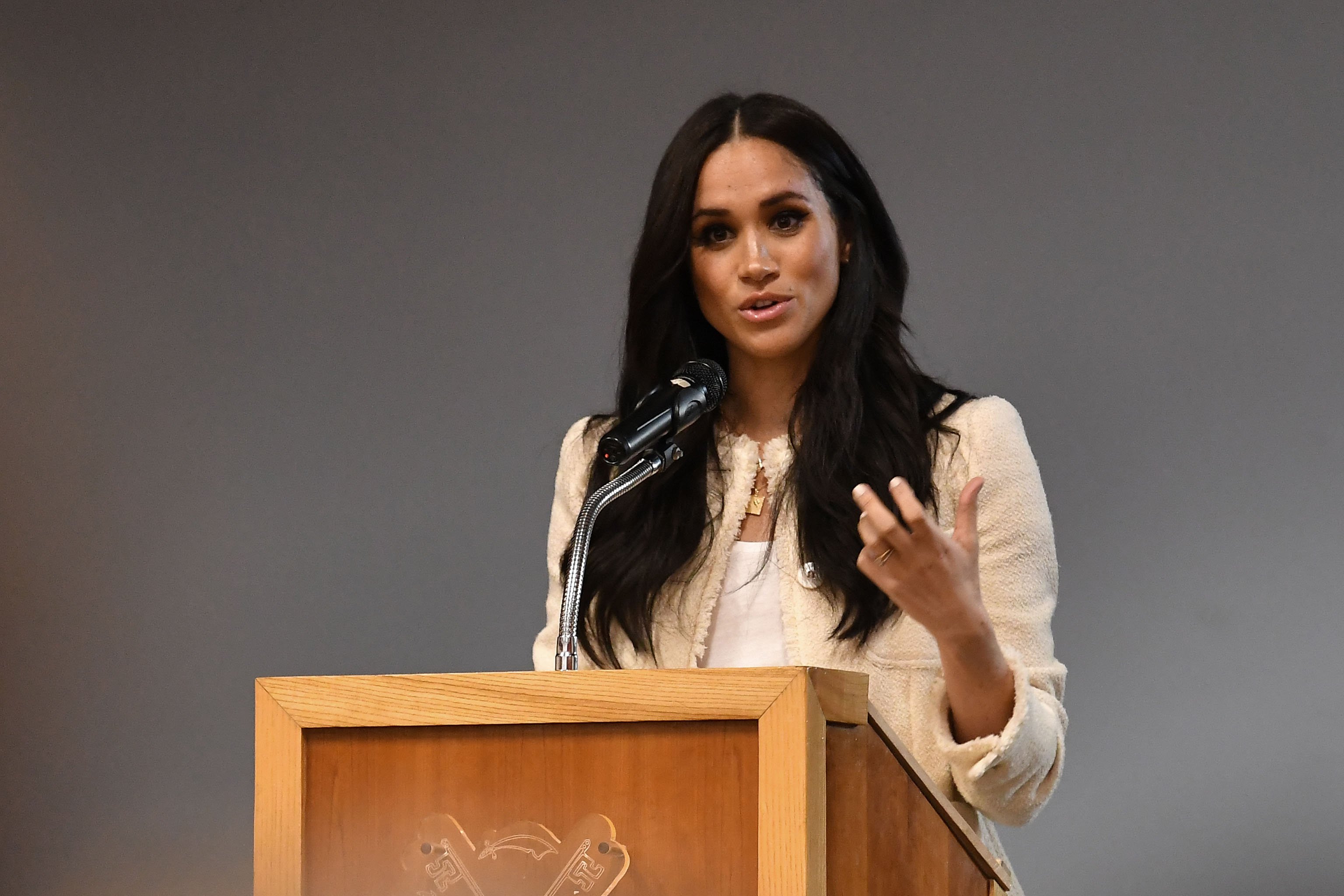 Meghan Markle speaking onstage during a special school assembly ahead of International Women’s Day in 2020