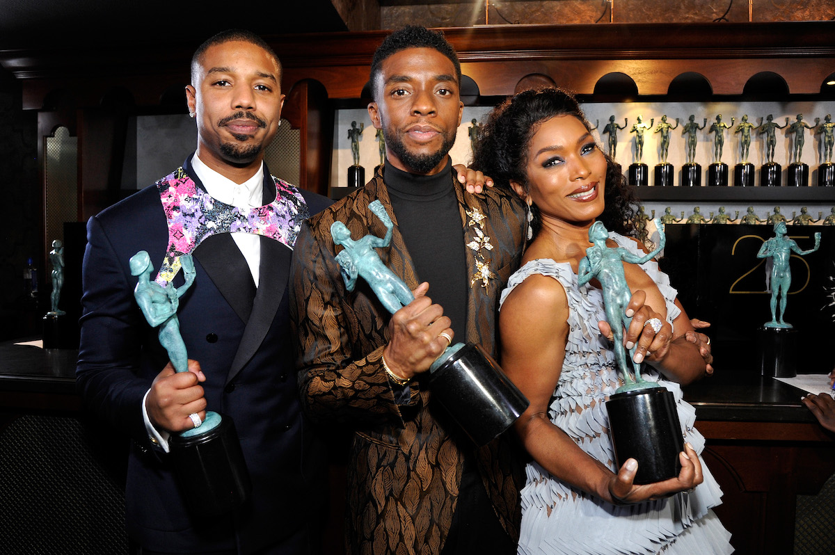 Michael B. Jordan, Chadwick Boseman, and Angela Bassett pose together with their Screen Actors Guild Awards statues