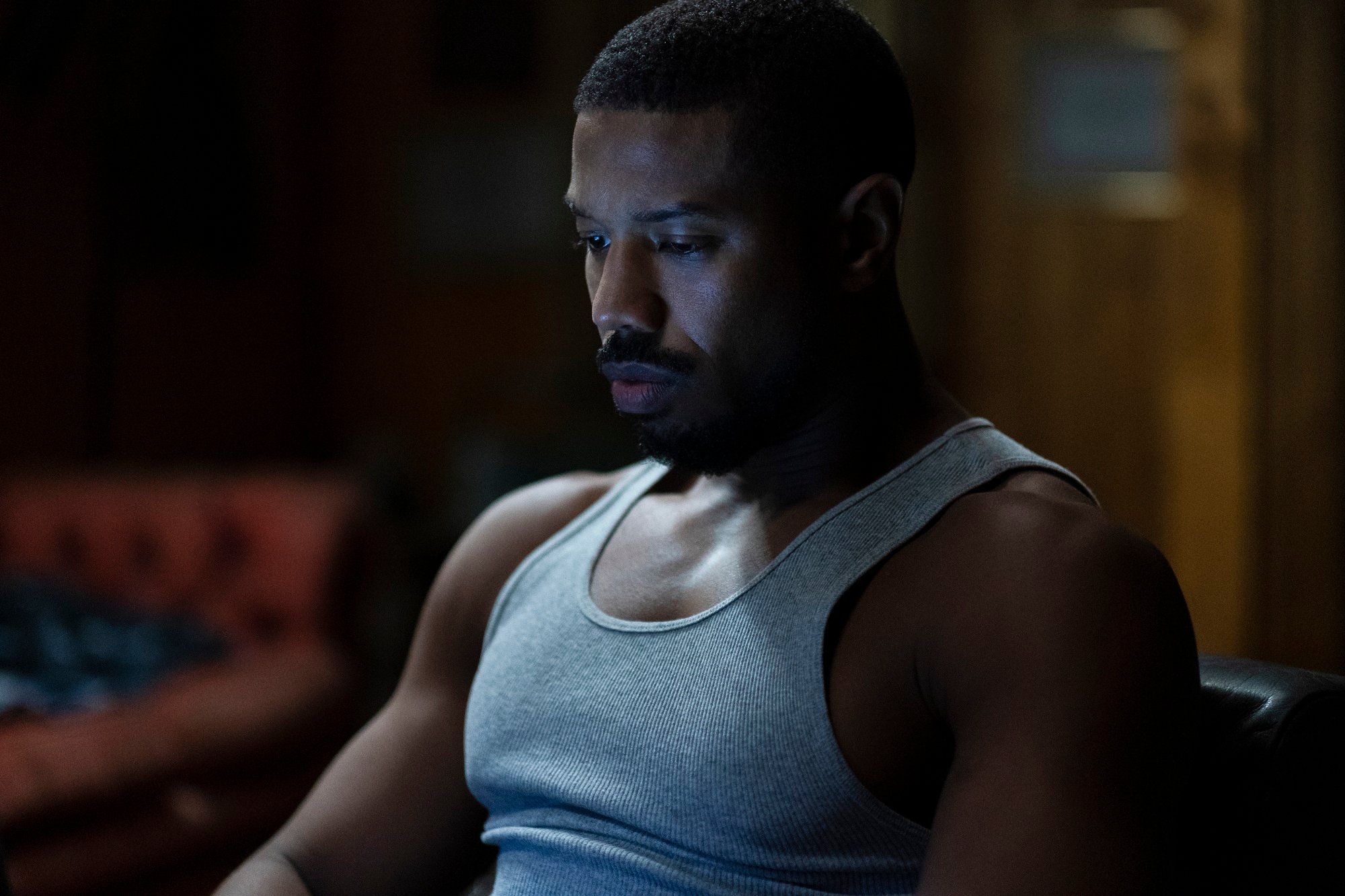 Michael B. Jordan in a white tank top