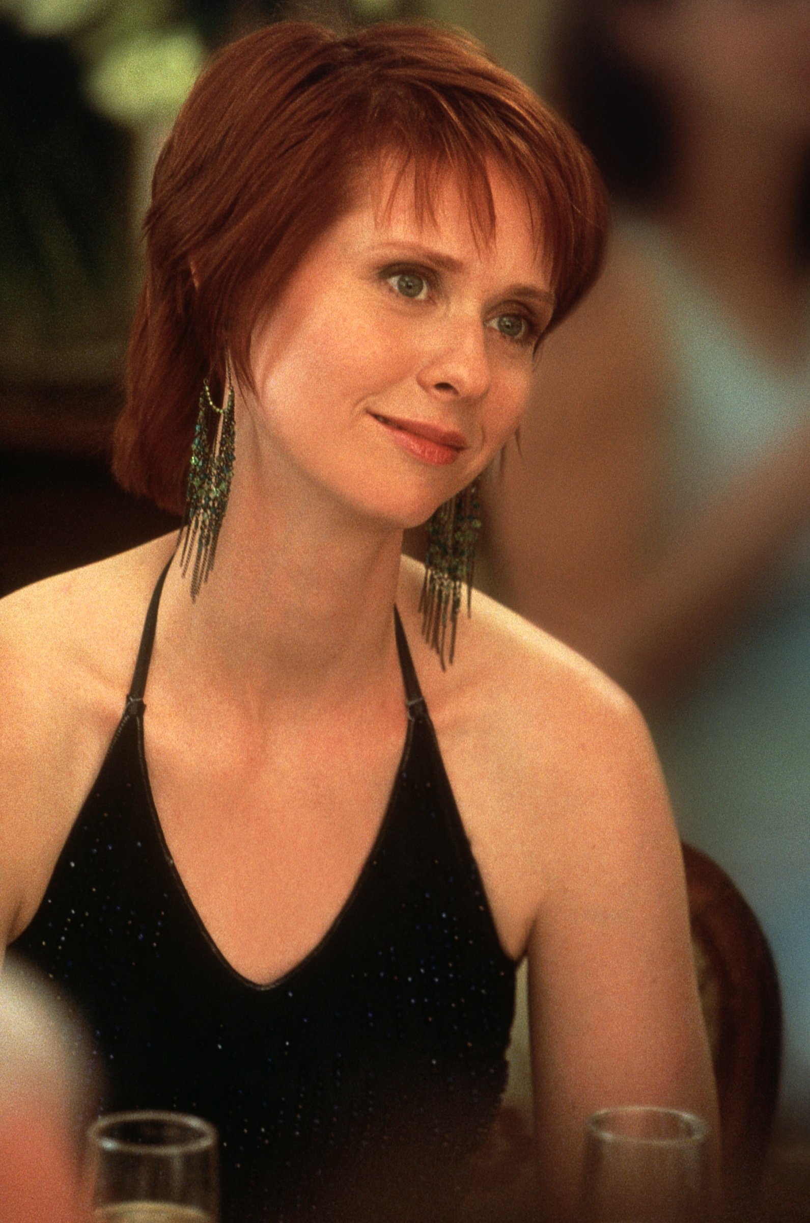 Cynthia Nixon as Miranda Hobbes wears a black halter top during the filming of 'Sex and the City' season 3