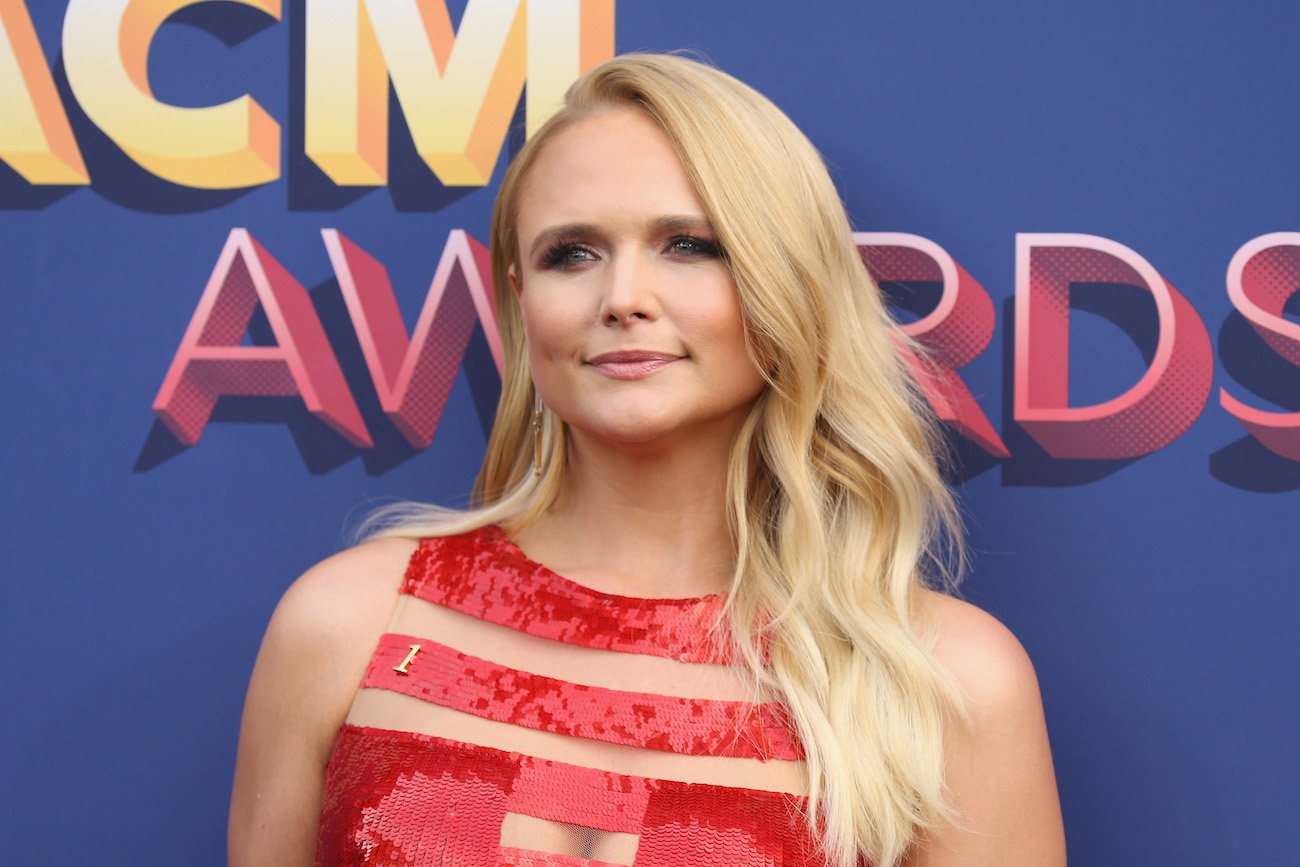 Miranda Lambert looks on