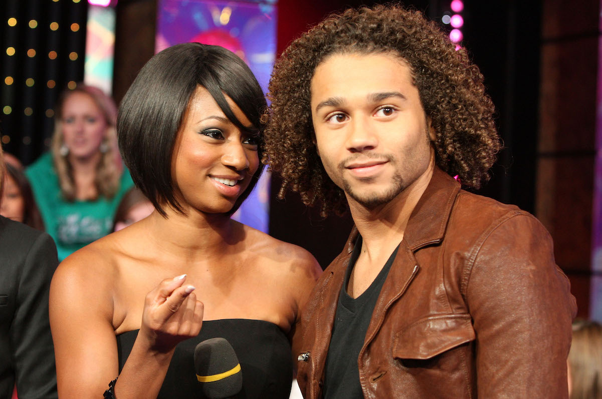 Monique Coleman saying something to co-star Corbin Bleu at 'TRL'