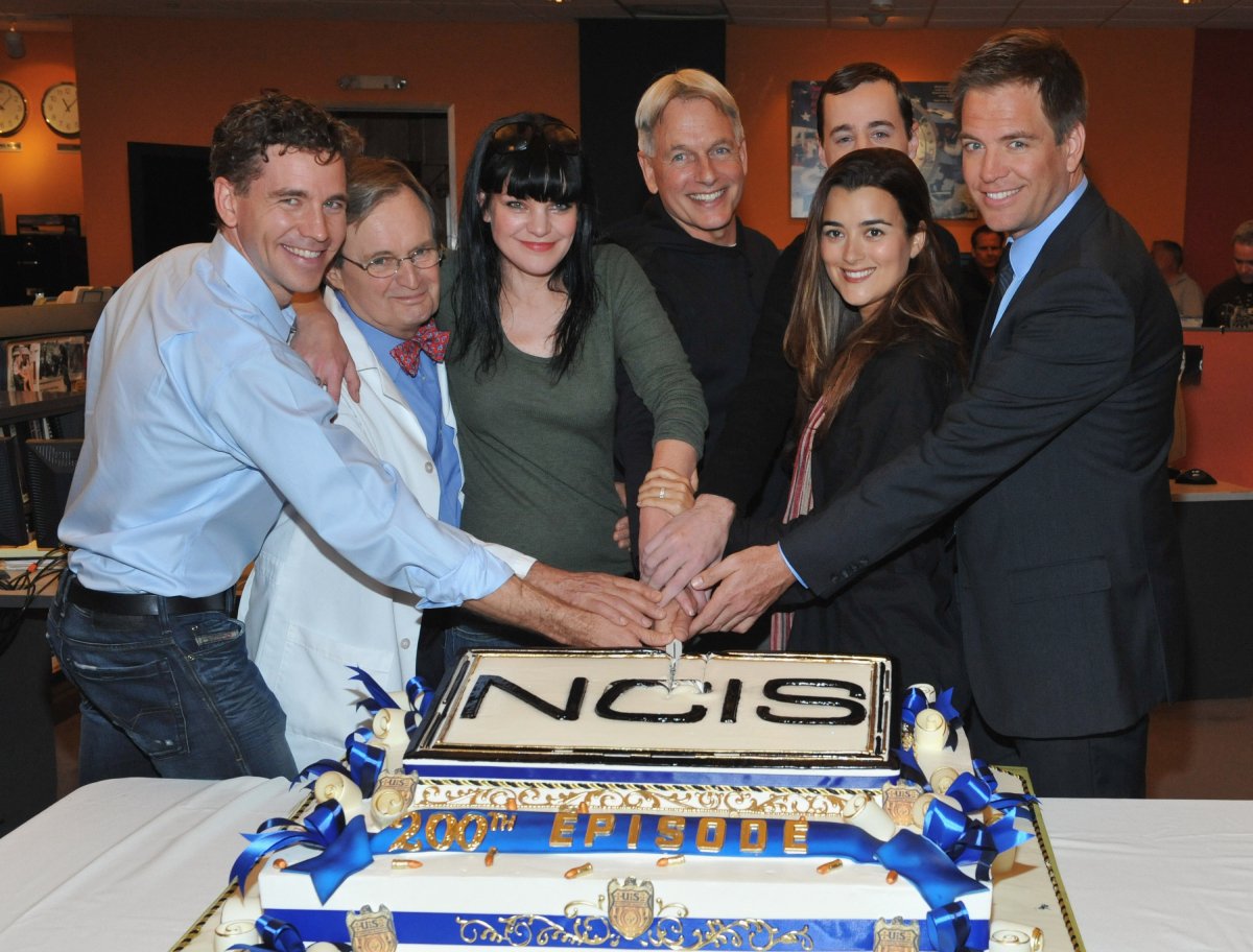 Brian Dietzen, David McCallum, Pauley Perrette, Mark Harmon, Sean Murray (backrow)Cote de Pablo and Michael Weatherly pose at CBS' "NCIS" celebration of their 200th episode on January 3, 2012