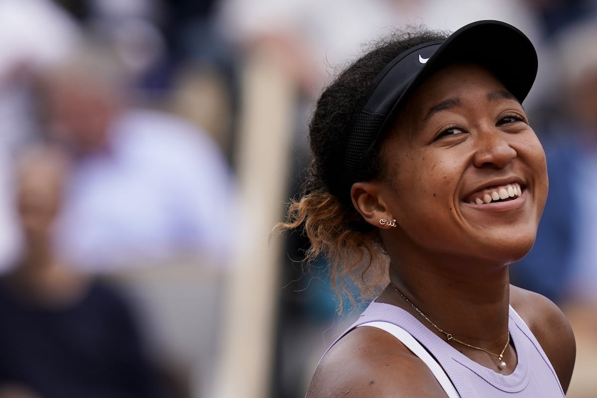 Japan's Naomi Osaka celebrates after winning against Belarus' Victoria Azarenka during their women's singles second round match on day five of The Roland Garros 2019 French Open tennis tournament in Paris on May 30, 2019.