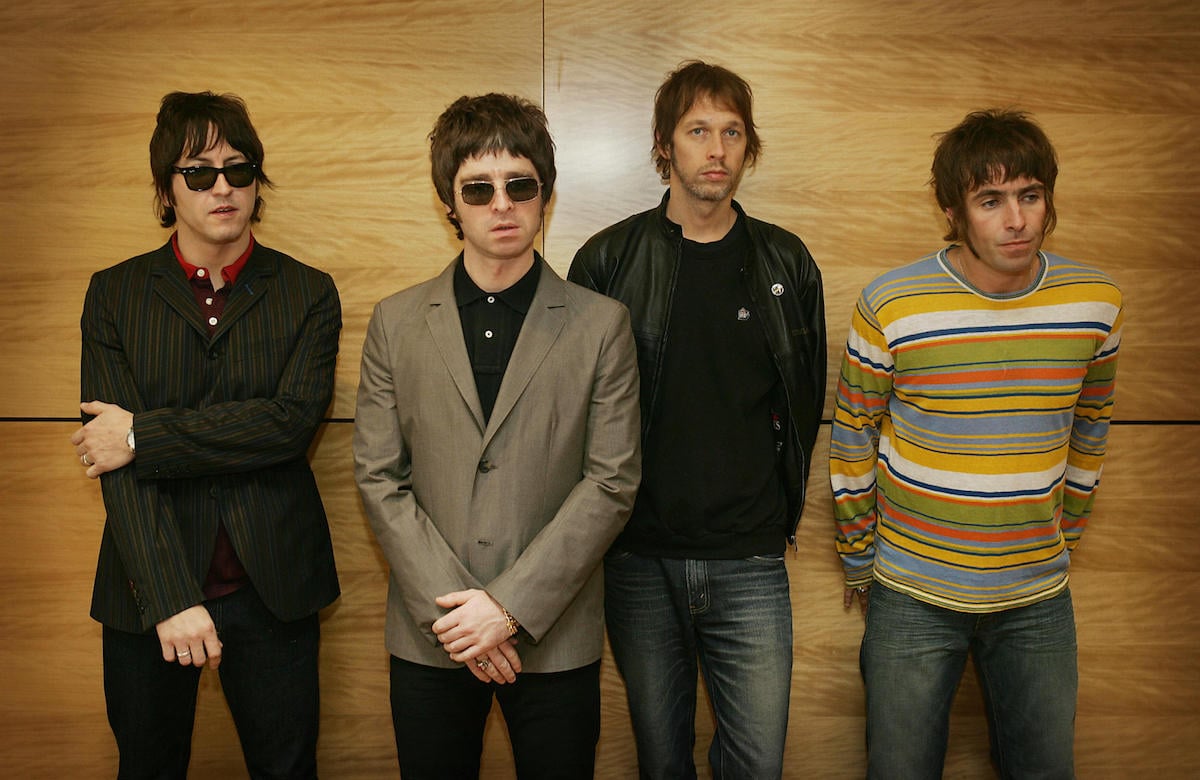 From L-R Gem, Noel Gallagher, Andy Bell and Liam Gallagher, members of the British rock band "Oasis" hold a photocall in Hong Kong 25 February 2006. The Band are to hold a concert 25 February.