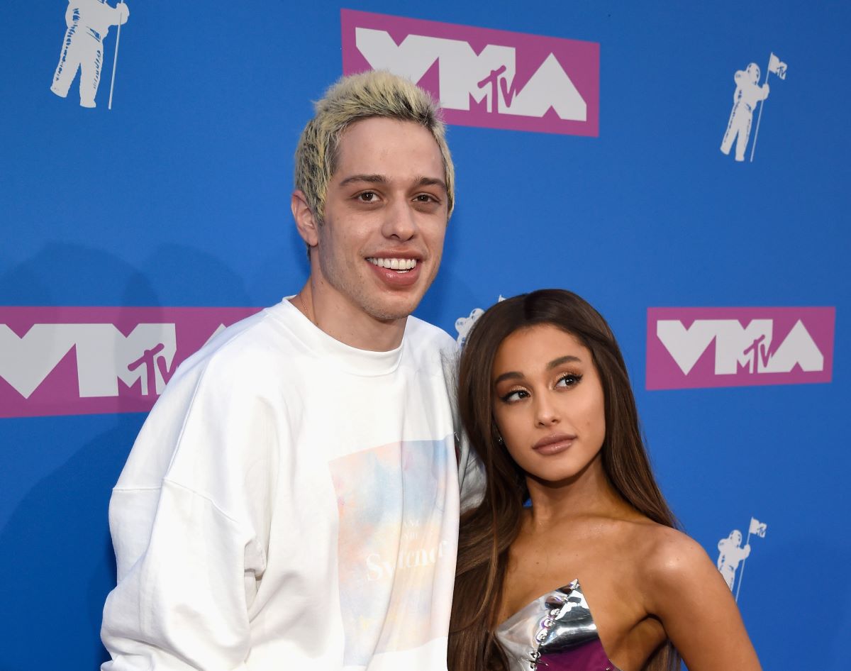 Pete Davidson and Ariana Grande hug one another