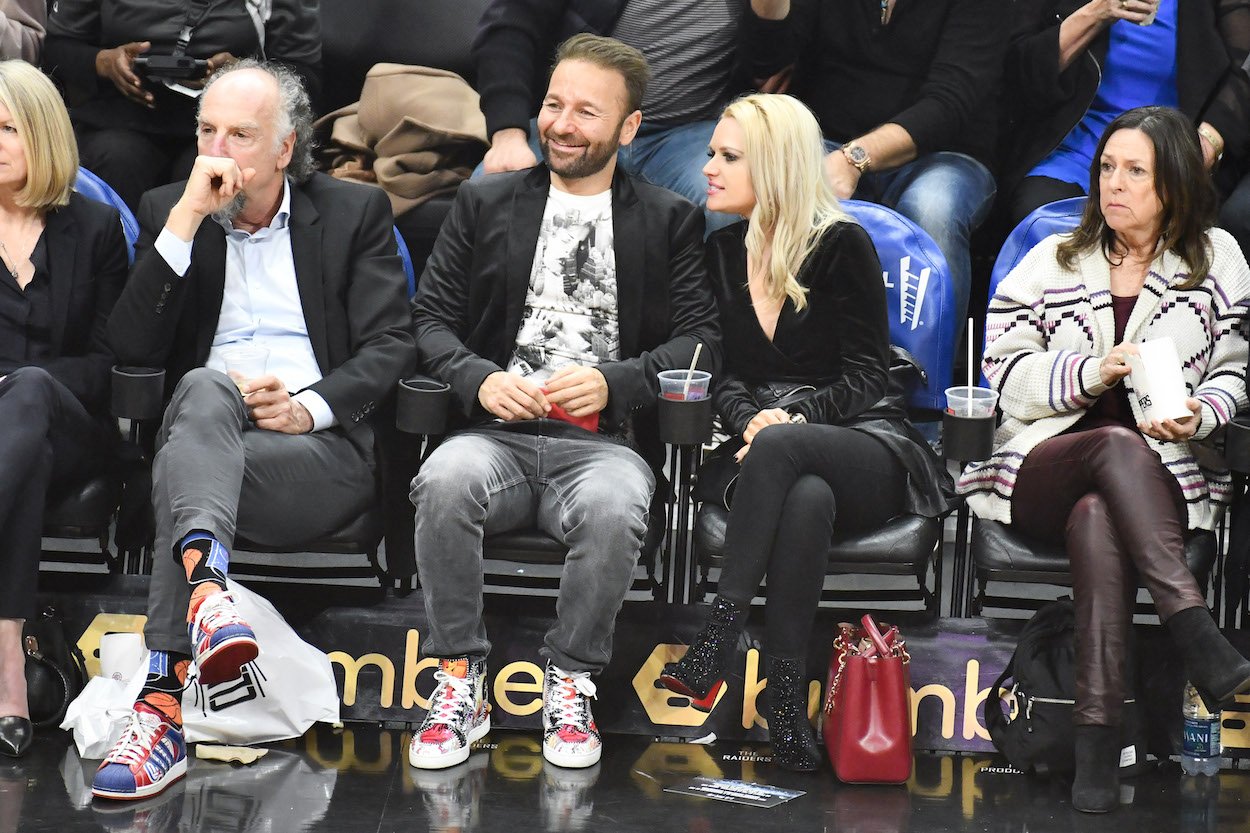 Poker pro Daniel Negreanu and Amanda Leatherman attend an NBA game