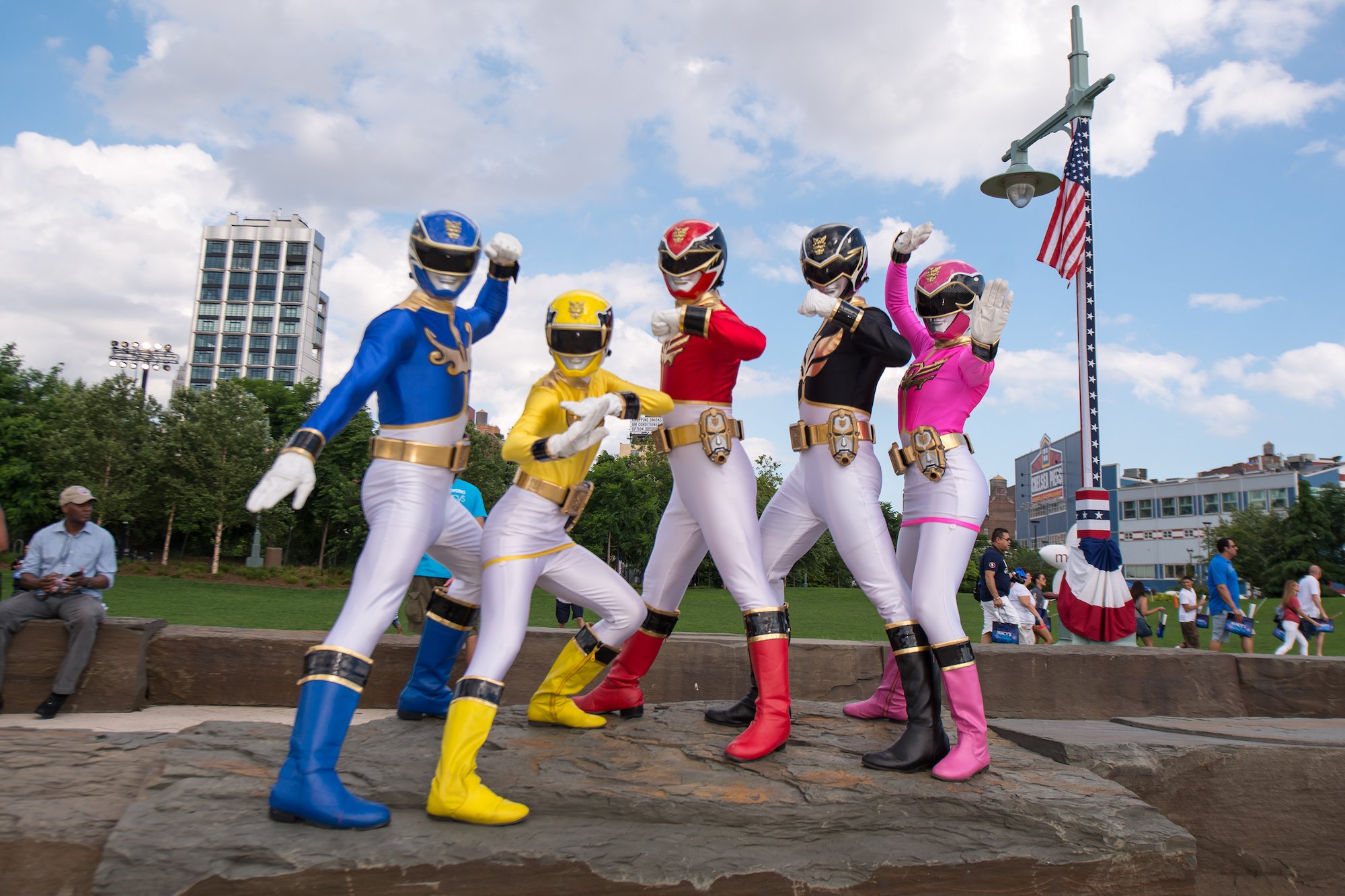 Power Rangers standing in a park