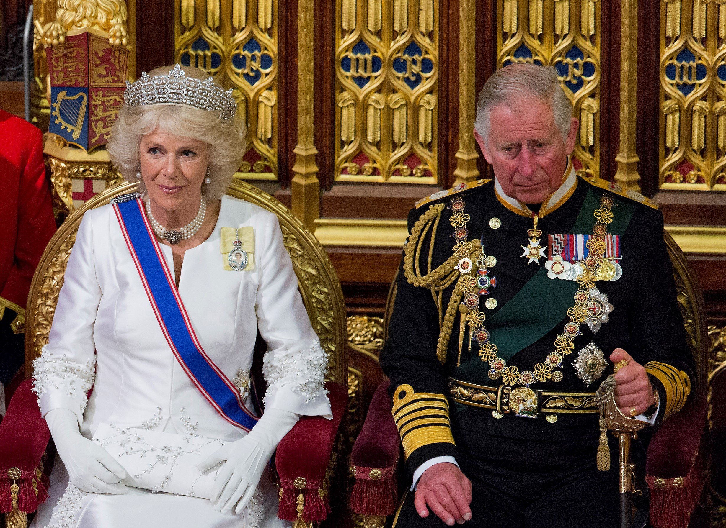 Prince Charles and Camilla Parker Bowles seated next to each other during State Opening of Parliament in the House of Lords