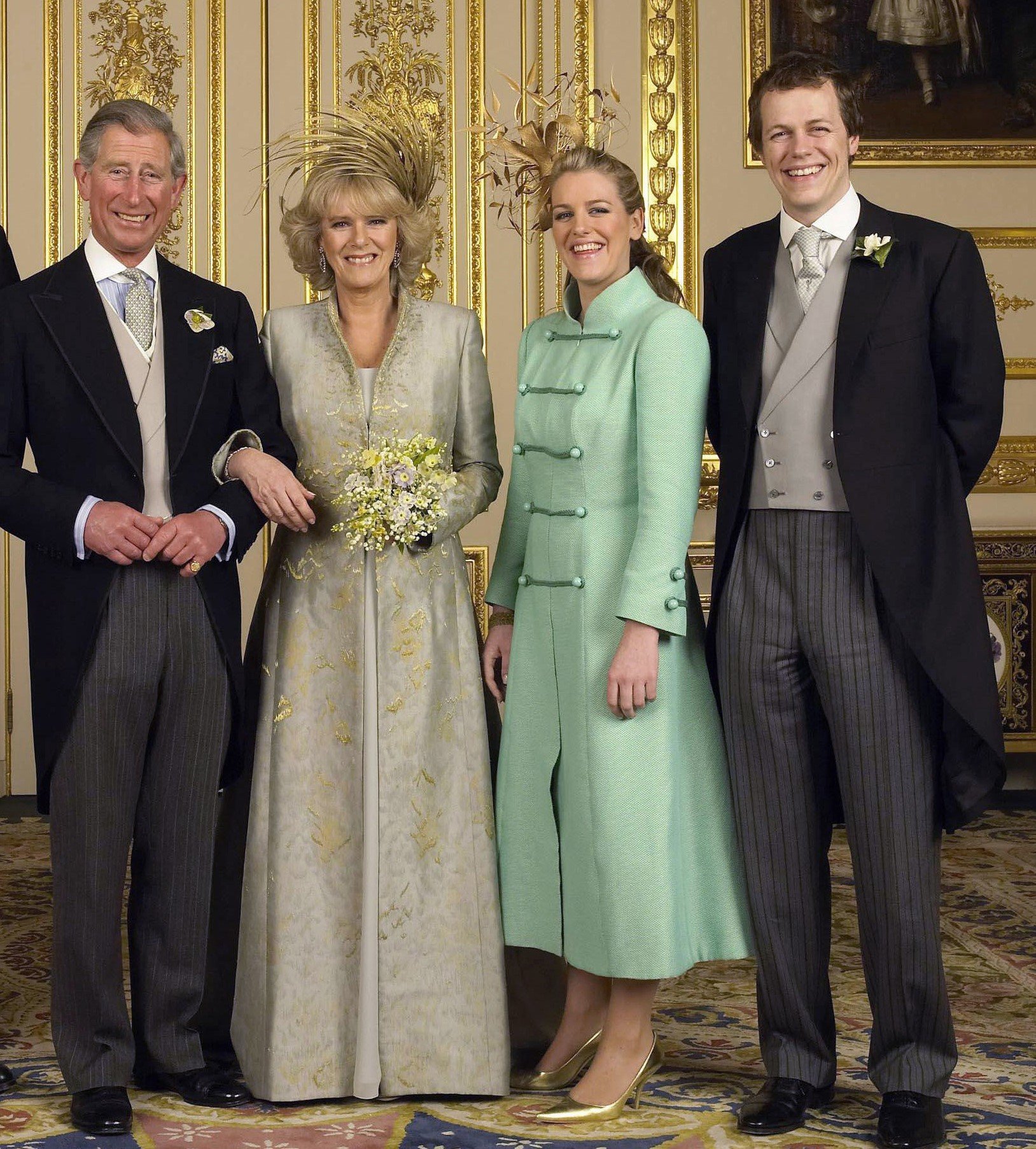 Prince Charles and Camilla Parker Bowles' wedding photo next to Camilla's son, Tom, and daughter, Laura