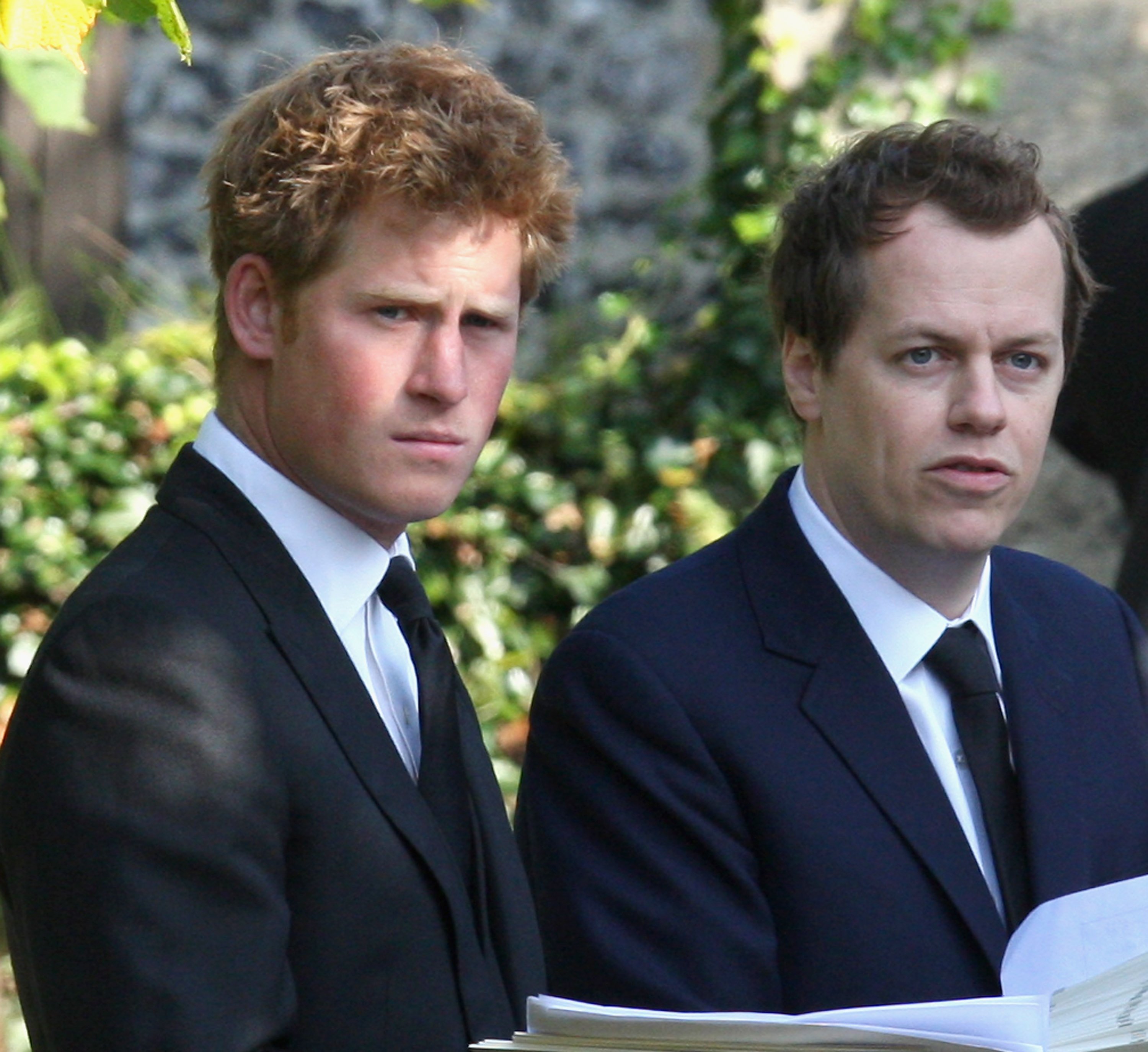 Prince Harry and Tom Parker Bowles next to each other during a Thanksgiving service at St. Mary's Church