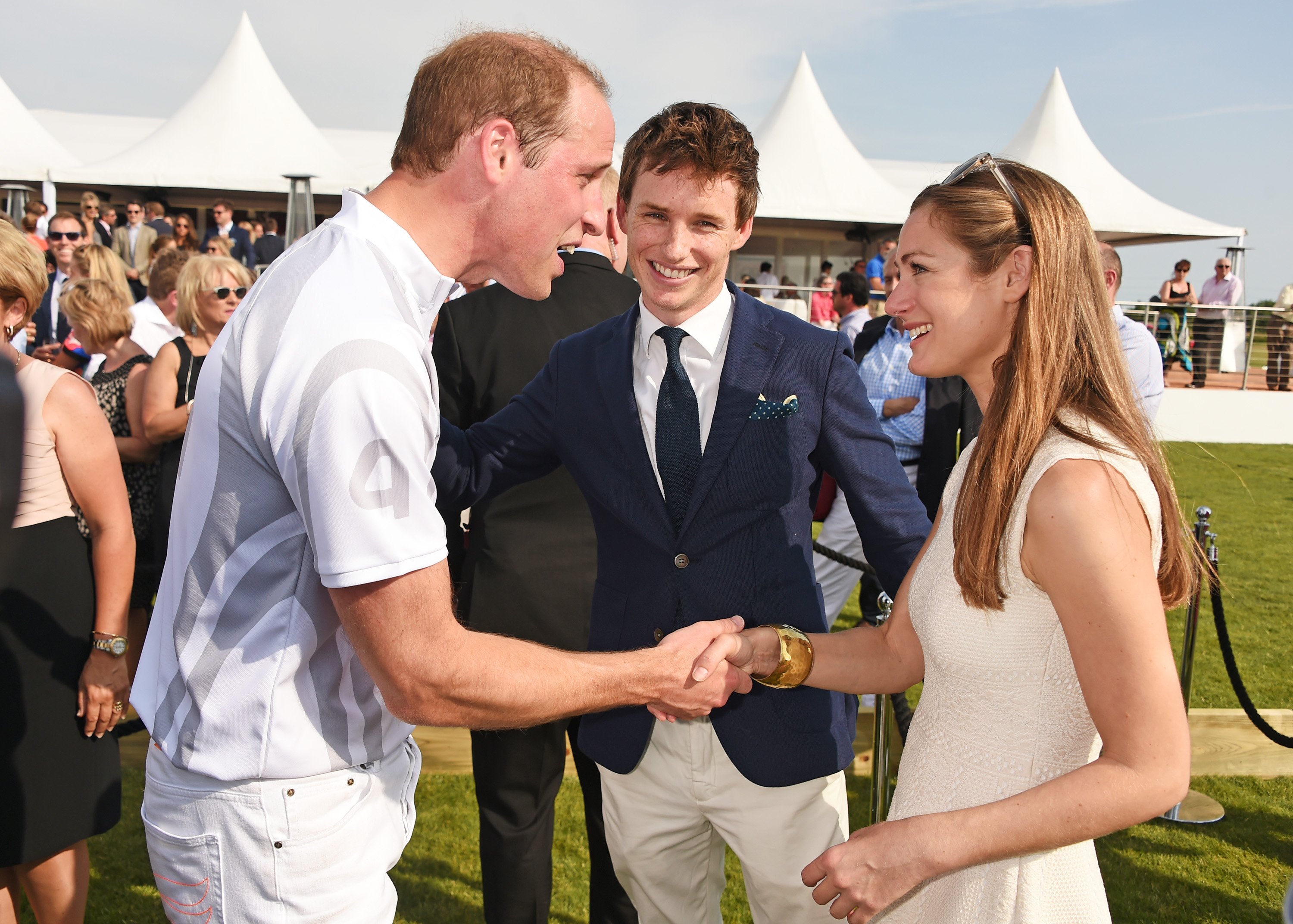 Prince William greeting Eddie Redmayne and his wife, Hannah Bagshawe, at the Audi Polo Challenge in 2015