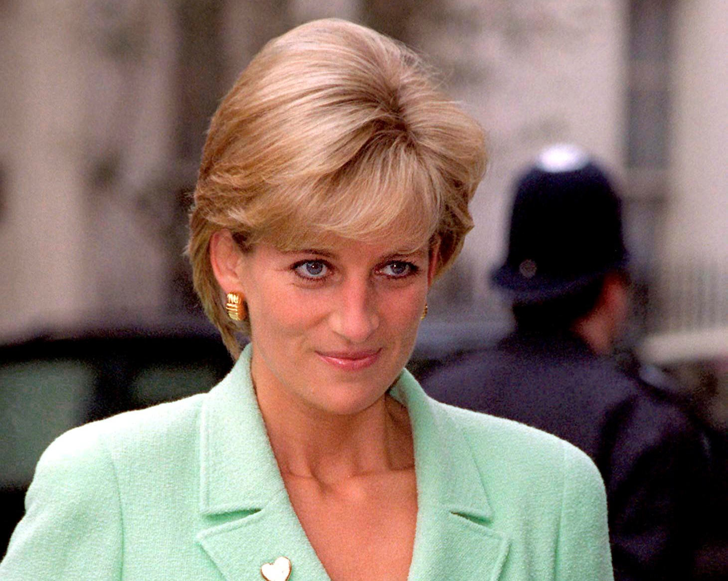 Princess Diana in pale green suit at the Great Ormond Street Hospital in London