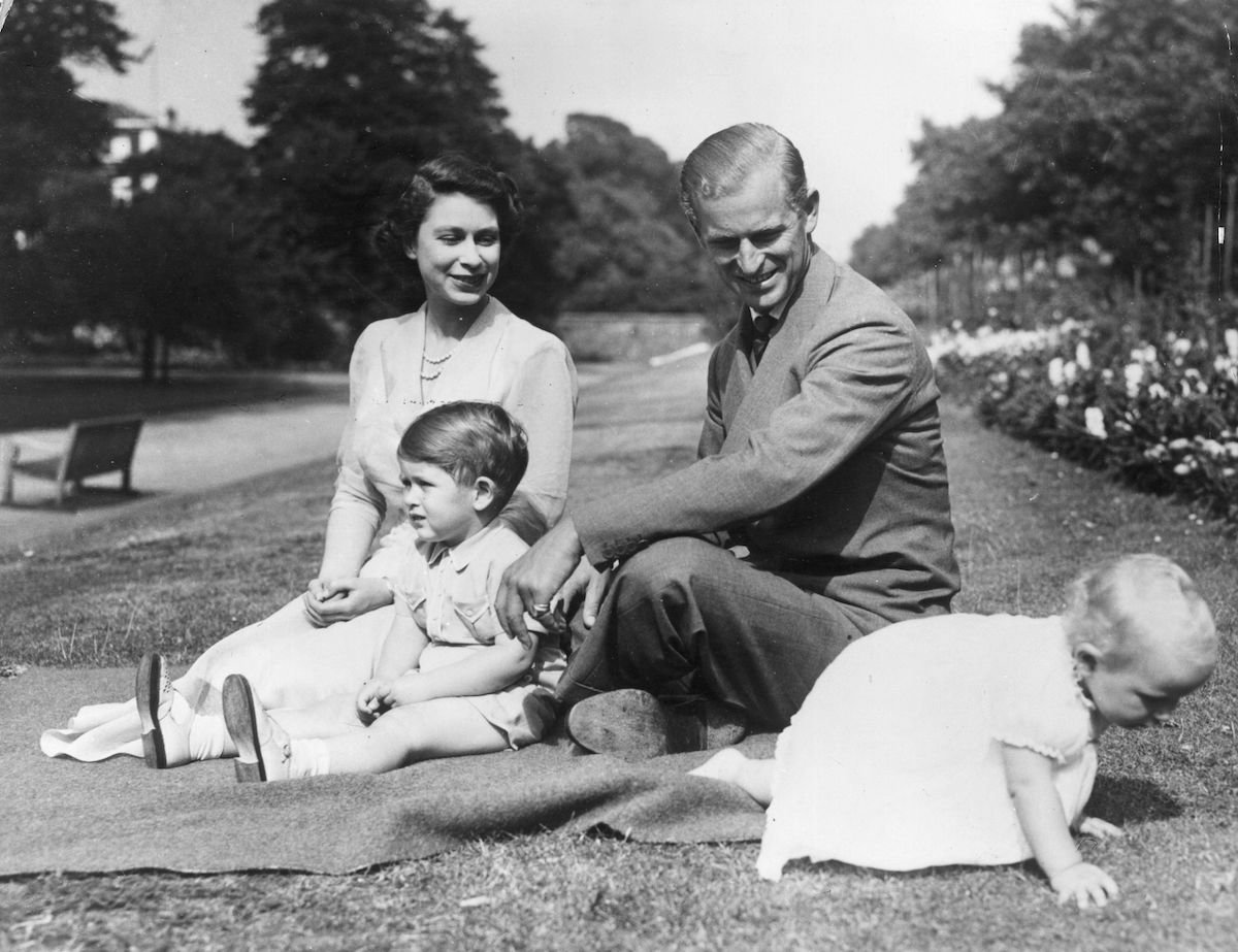 Prince Philip, Queen Elizabeth, Prince Charles and Princess Anne pose on Clarence House grounds