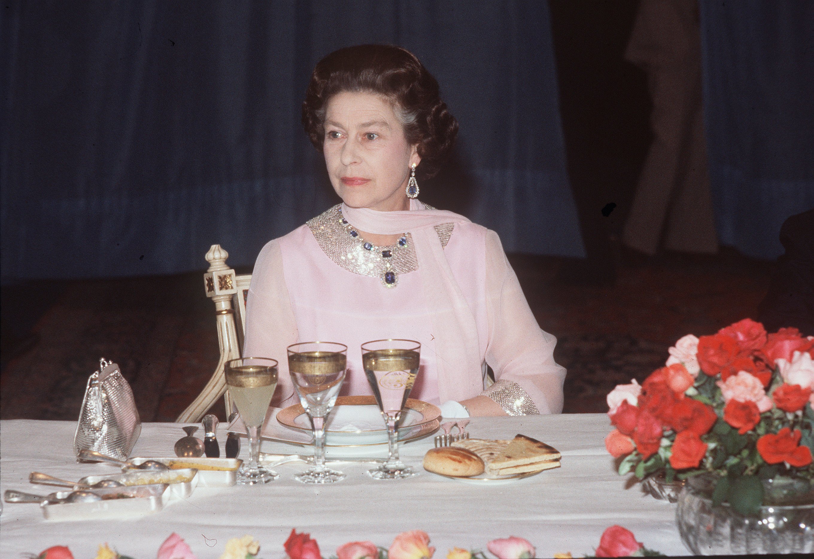 Queen Elizabeth ll seated at a State Banquet on October 25, 1980 in Algiers, Algeria