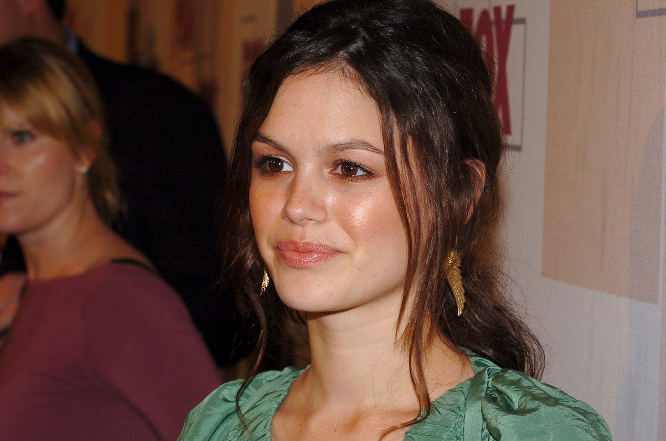 Rachel Bilson looks on