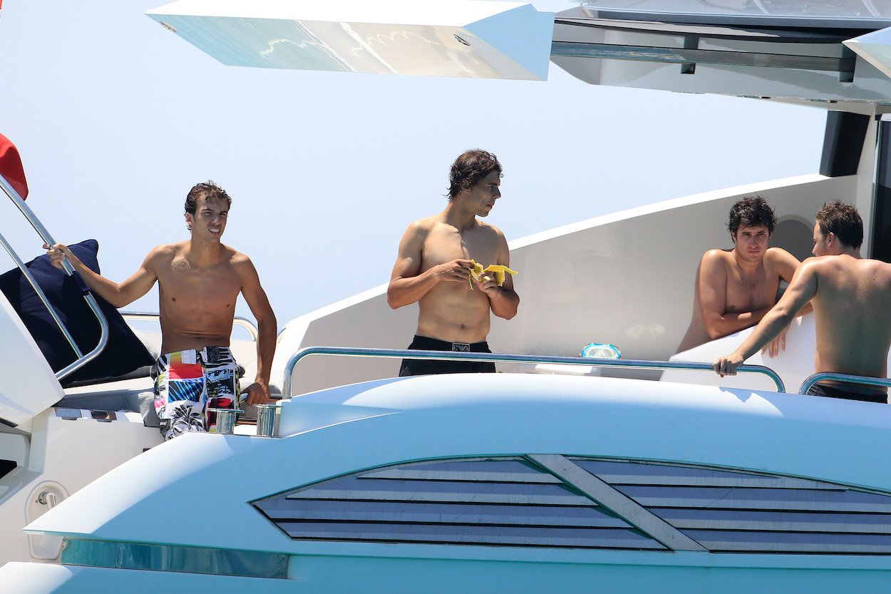 Rafa Nadal (C) and friends enjoy the holidays on a yacht in Mallorca, Spain