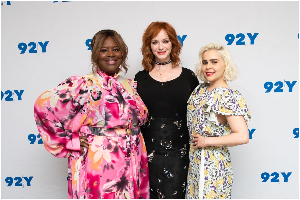 (L-R): 'Good Girls' stars Retta, Christina Hendricks, and Mae Whitman posing and smiling on the red carpet. 