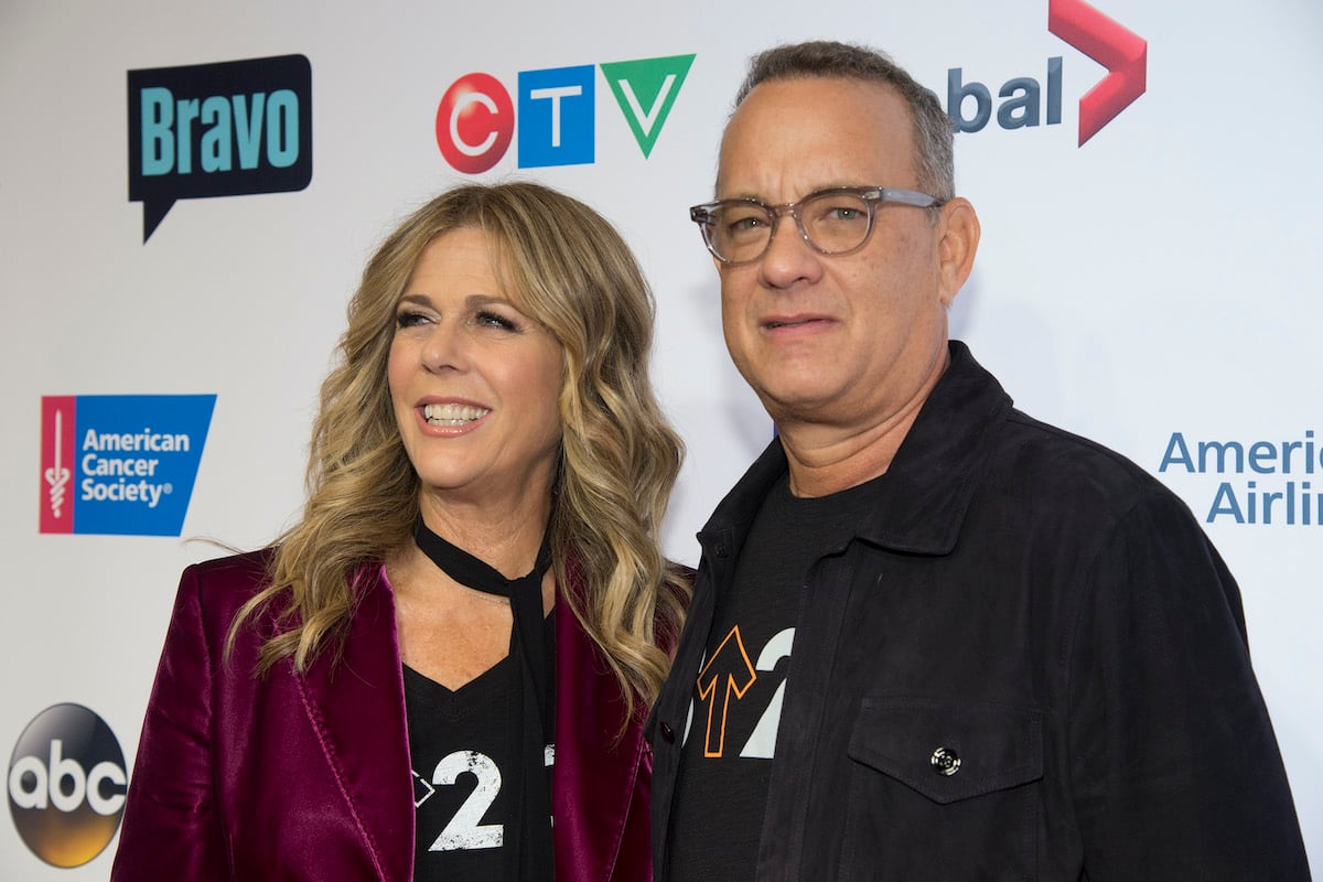 Rita Wilson and Tom Hanks pose at a red carpet event