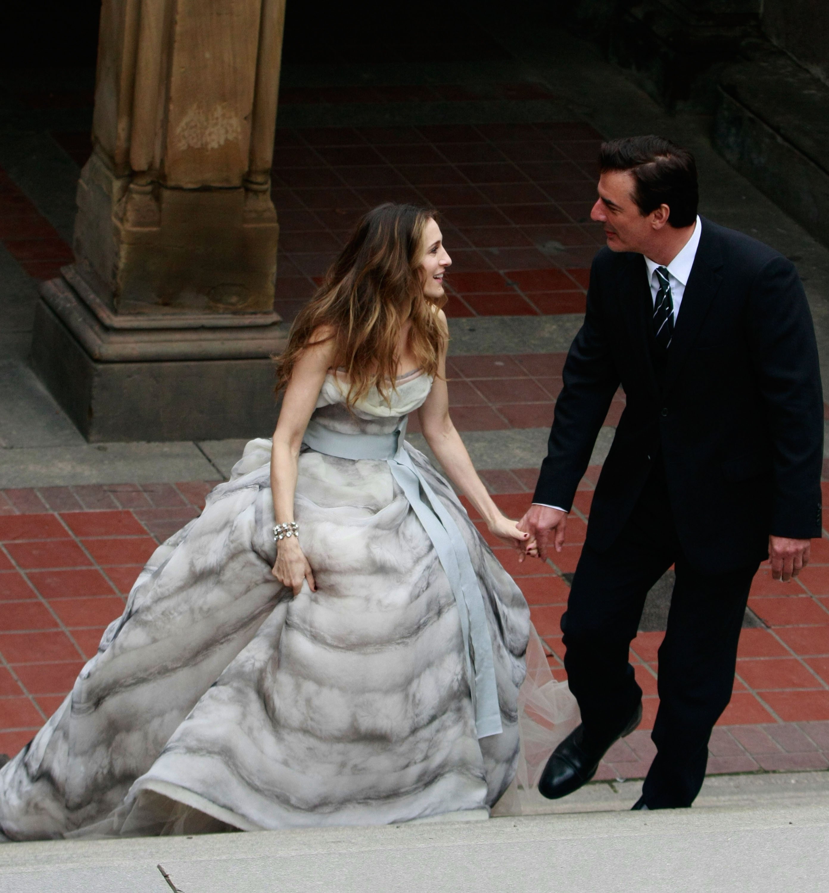 Sarah Jessica Parker and Chris Noth walk in Central Park holding hands during a photoshoot