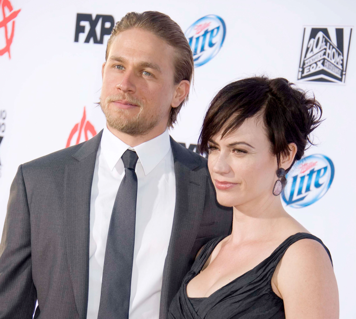 Charlie Hunnam and Maggie Siff arrive at FX's "Sons Of Anarchy" Season 6 premiere screening at Dolby Theatre on September 7, 2013