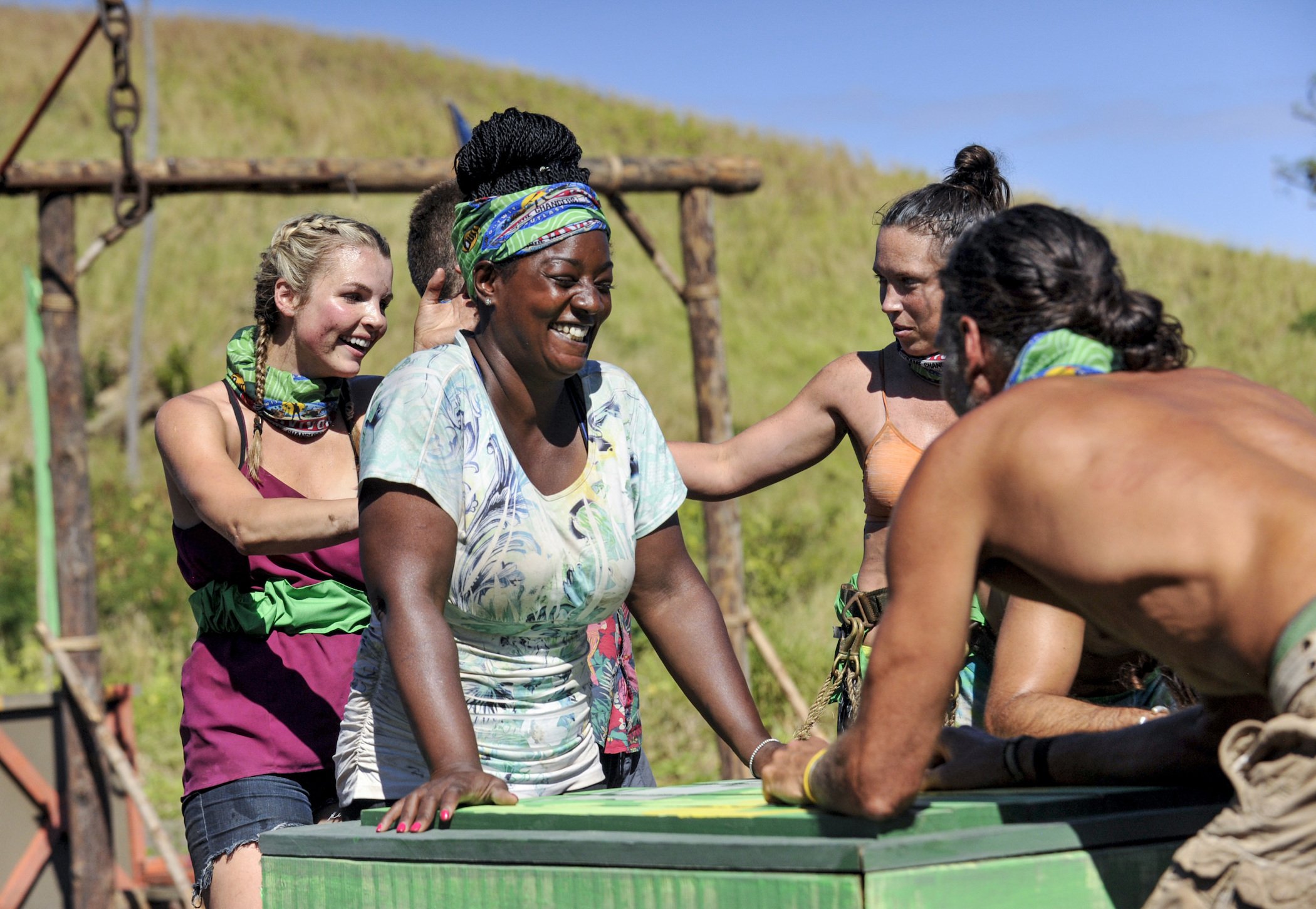 Cirie Fields laughing with a contestant on the beach in 'Survivor: Game Changers' 