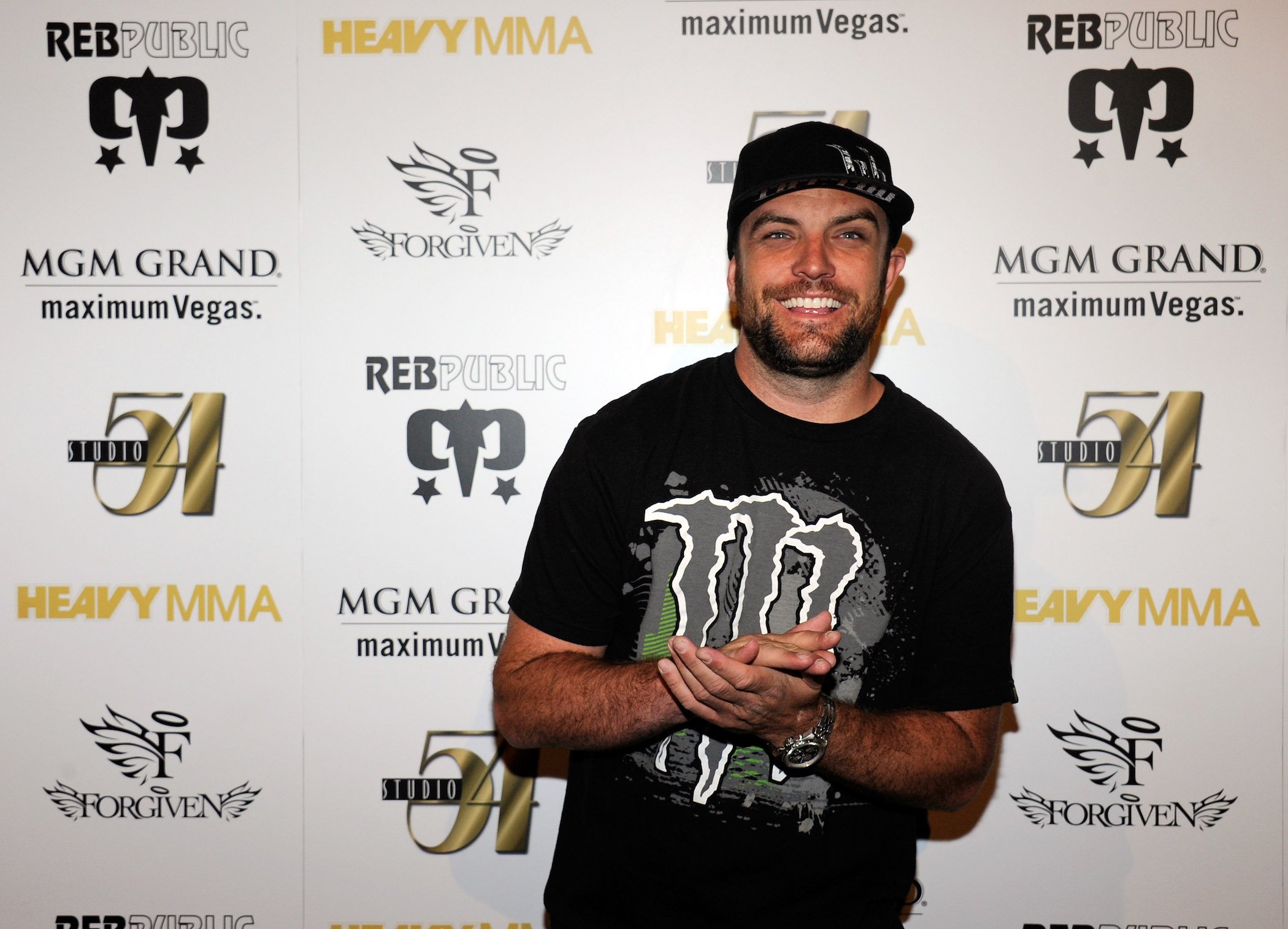 T.J. Lavin, the host of MTV's 'The Challenge,' smiling at an event