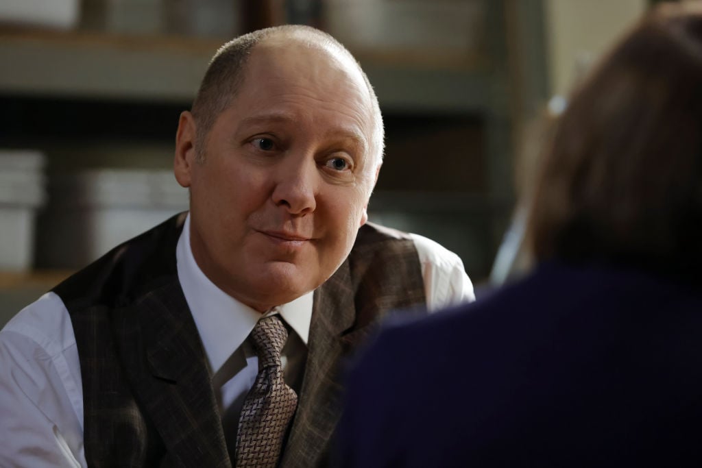 James Spader as Raymond 'Red' Reddington looks over at someone as he sits on season 8 of 'The Blacklist' 