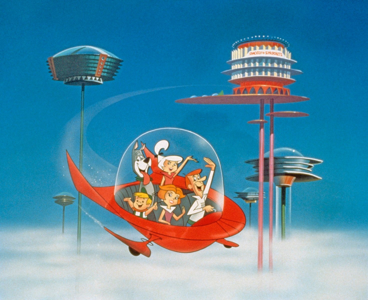 The Jetson family waves as they fly past Orbit City in 'The Jetsons'