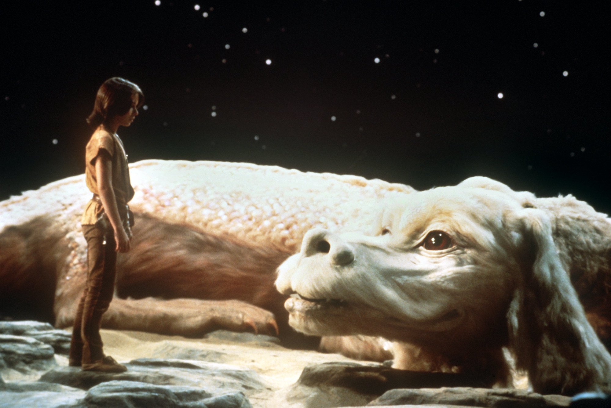 Noah Hathaway as Atreju with the white dragon from 'The NeverEnding Story'