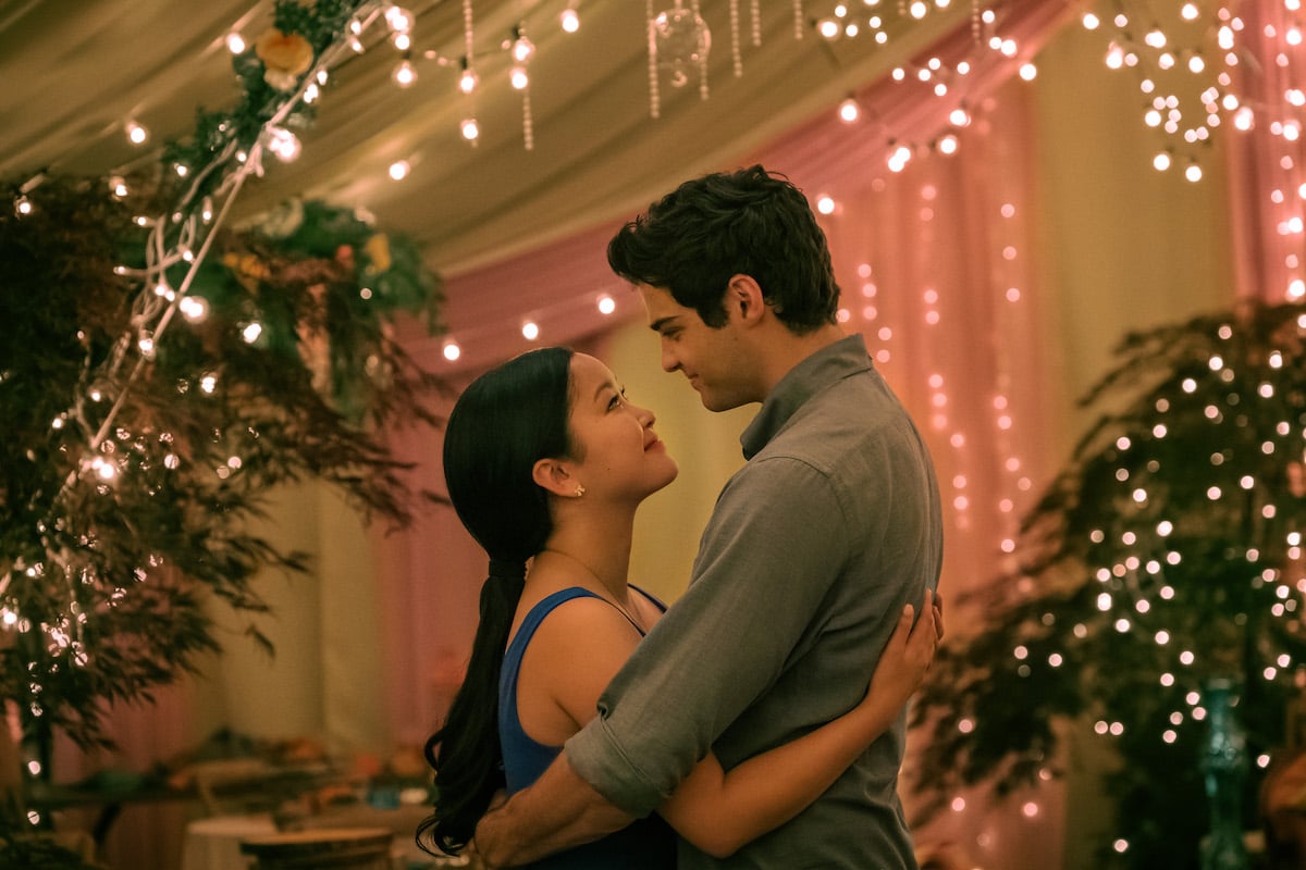 LANA CONDOR as LARA JEAN, NOAH CENTINEO as PETER hug looking at each other in 'TO ALL THE BOYS: ALWAYS AND FOREVER'