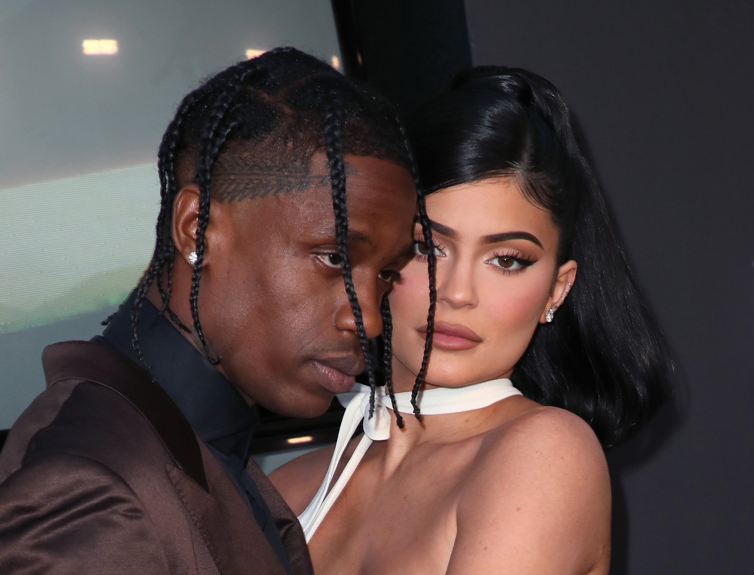 Travis Scott and Kylie Jenner pose close together at the premiere of Netflix documentary about the rapper