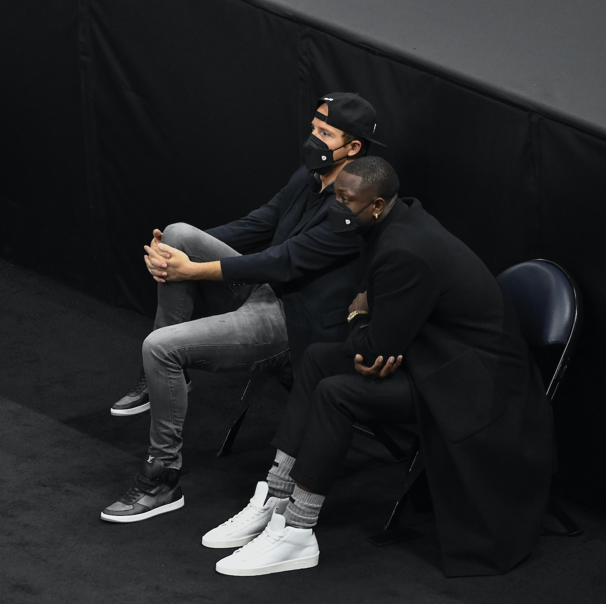 Utah Jazz owners Ryan Smith and Dwyane Wade look on during a game