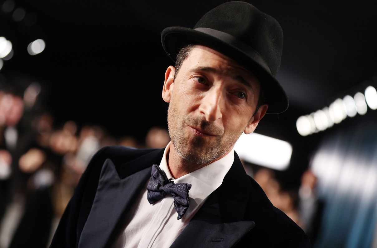 Adrien Brody looks off-camera at the 2020 Vanity Fair Oscar party.