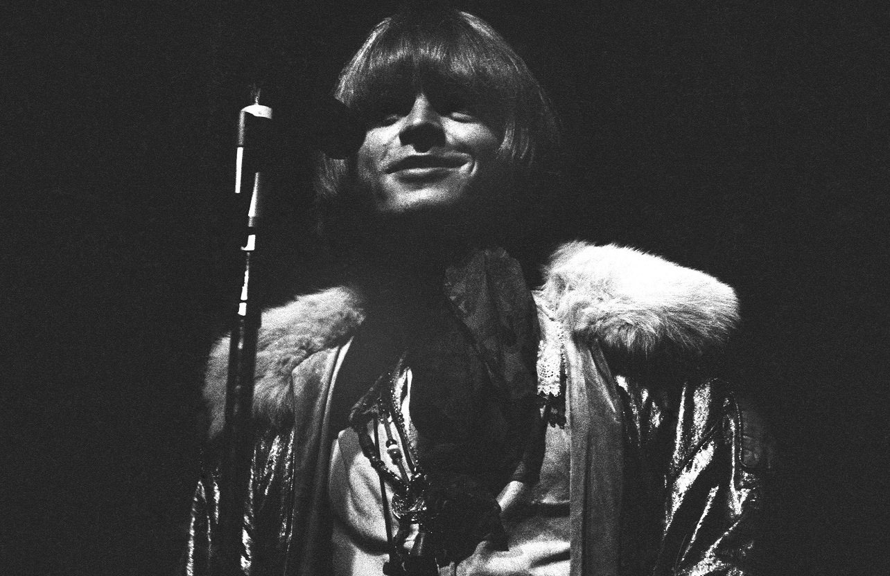 Brian Jones smiling at the microphone at Monterey Pop