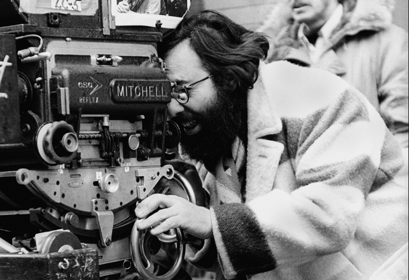 Francis Ford Coppola looks through the camera on the 'Godfather II' set.