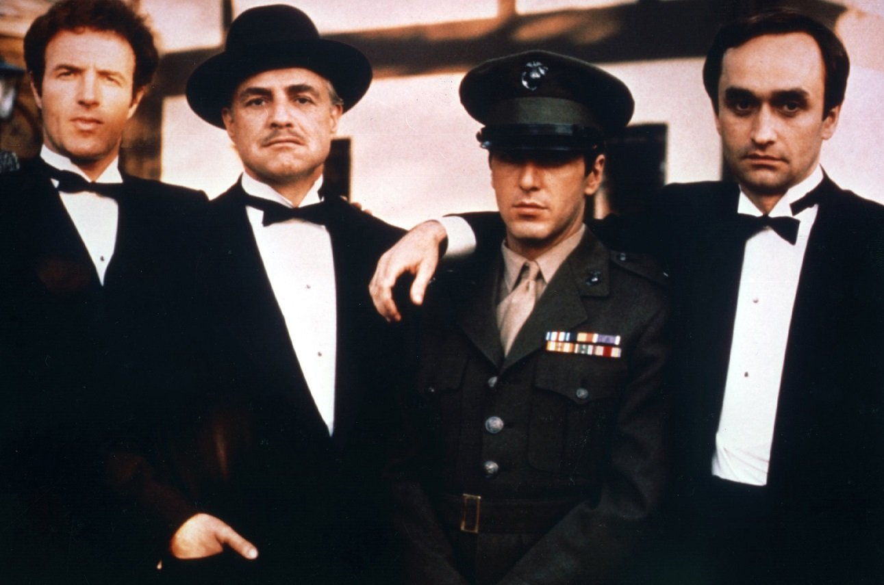 JAMES CAAN, MARLON BRANDO, AL PACINO, and JOHN CAZALE pose together for a 'Godfather' film promo.