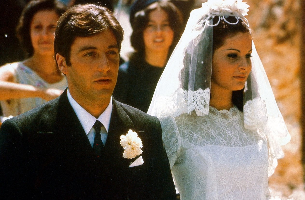 Al Pacino and Simonetta Stefanelli in wedding attire in a still from 'The Godfather.'