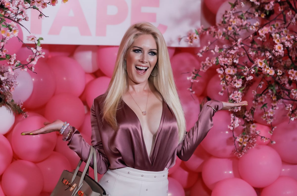 Heidi Montag wearing low cut purple top at the Booby Tape launch party