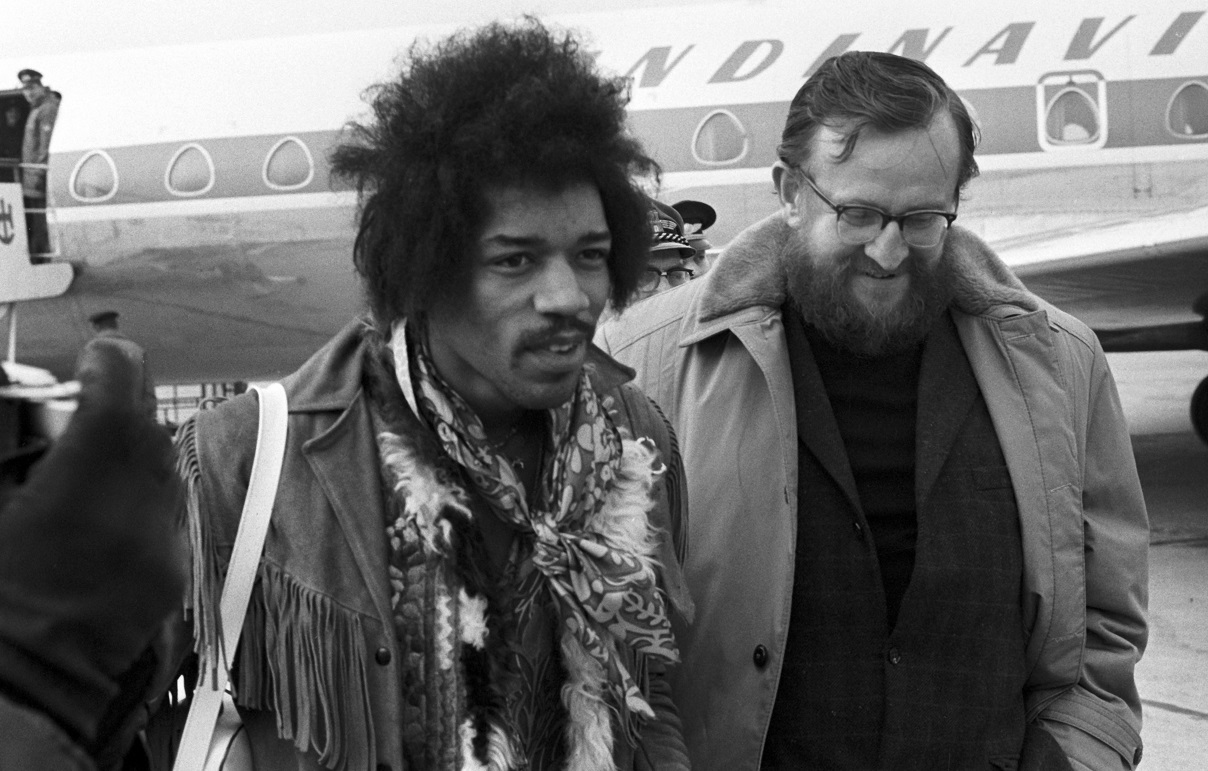 Jimi Hendrix smiles as he arrives at the Hamburg airport in 1969.
