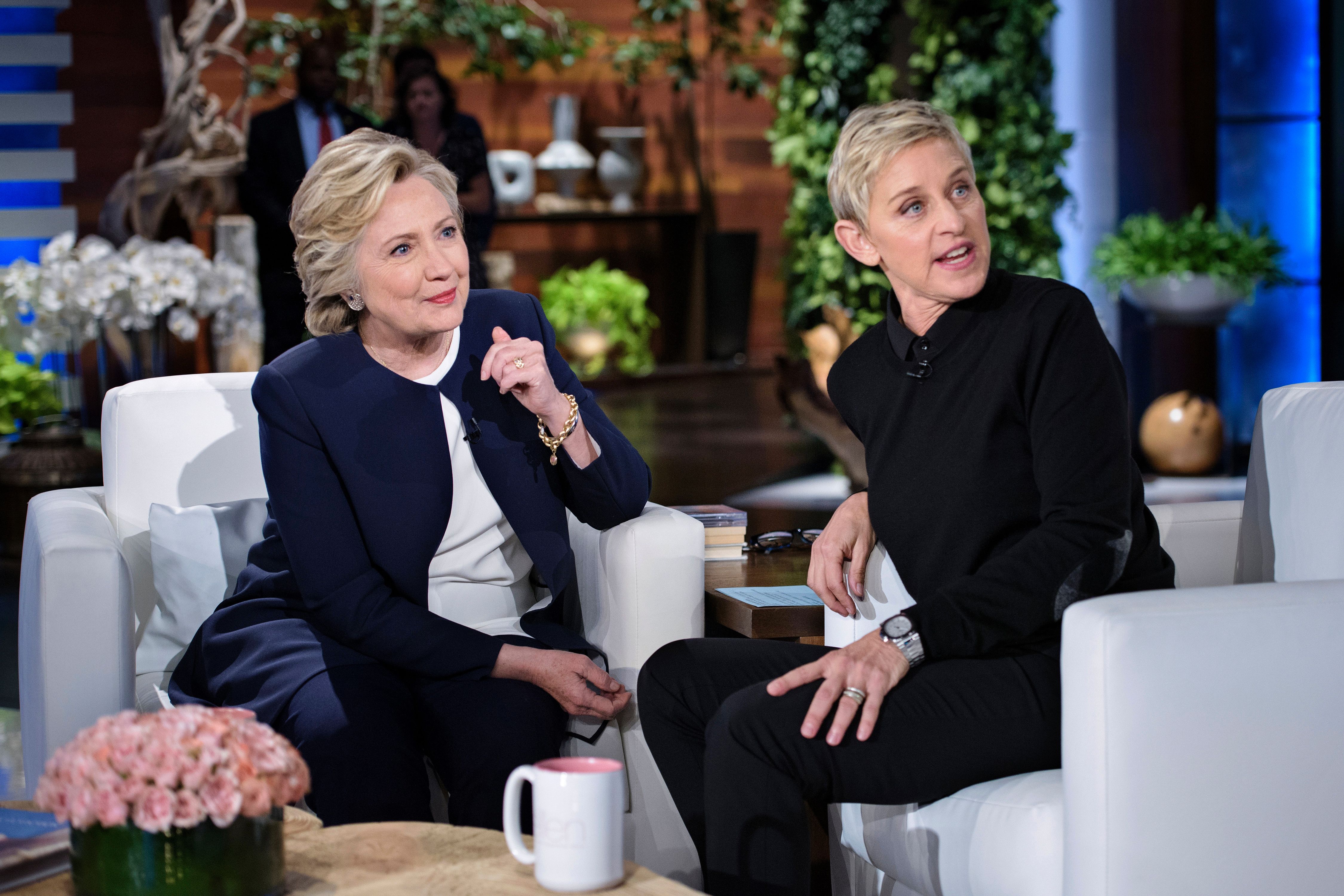 Hillary Clinton sits opposite Ellen DeGeneres during an appearance on Ellen's talk show
