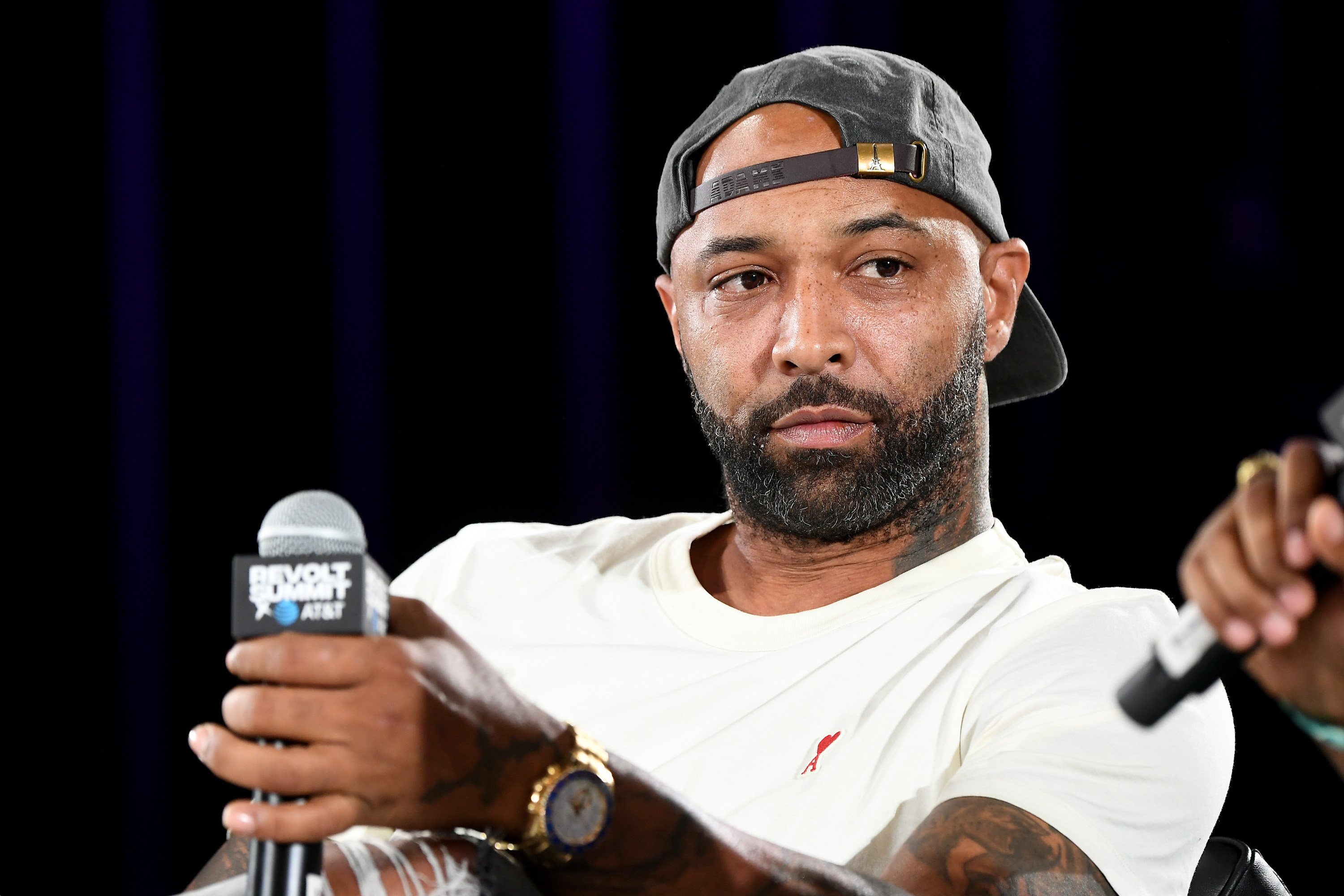 Joe Budden sitting