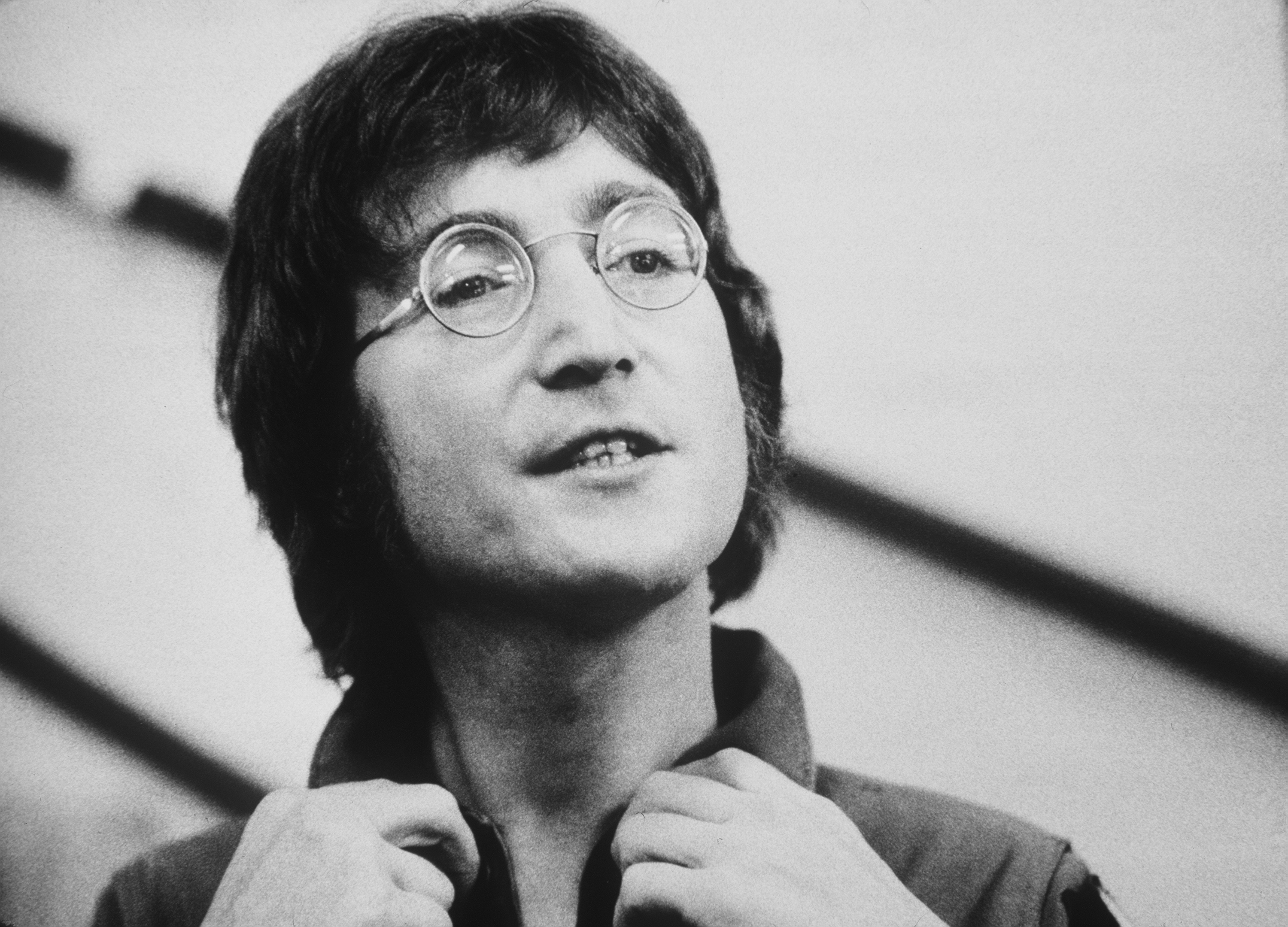 John Lennon wearing glasses