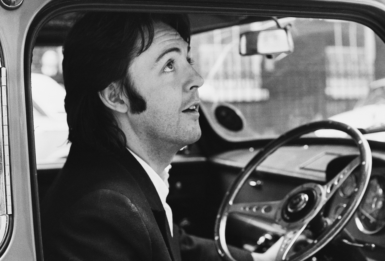Paul McCartney leaving Apple Headquarters in his Mini car, London, April 1969
